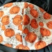 Pumpkins and Spiders. Face Mask .Fits most adults.cotton. poli fabric soft ear holder. Made in Oregon, washable. reusable
