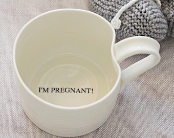 Pregnancy announcement mug