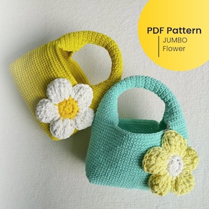 May include: Two crochet bags in yellow and teal, each with a large flower applique. The yellow bag has a white and yellow flower, while the teal bag has a yellow and white flower. The bags have a rounded handle and are set against a white background. Text on the image reads "PDF Pattern JUMBO Flower."