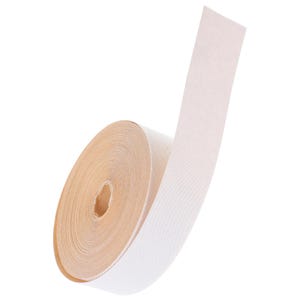 May include: A roll of beige fabric tape with a white, textured surface. The tape is partially unrolled, revealing the inner core. The tape is likely used for crafting, sewing, or other DIY projects.