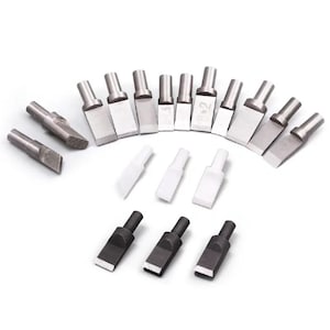 May include: An assortment of metal tools with various blade shapes and sizes. The tools are primarily silver, with some having black or white components. The arrangement suggests a set of specialized instruments, possibly for crafting or repair.