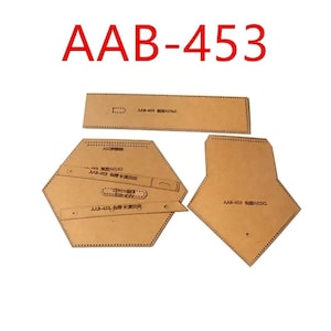 May include: A set of brown leather craft patterns labeled "AAB-453". The patterns are for a hexagonal shape, a rectangular shape, and a diamond shape.