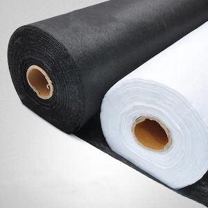 May include: A set of three ceramic mugs with a speckled, matte finish. The mugs are in shades of cream, light gray, and dark gray. Each mug has a simple, minimalist design, perfect for coffee or tea.