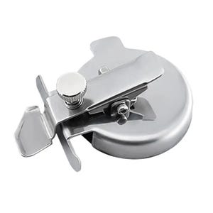 May include: A stainless steel bias tape maker with a round base and a hinged top. The tool has a small, adjustable knob and two angled guides for folding fabric strips into bias tape. The metal has a shiny, reflective surface.