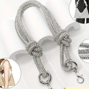 May include: Silver rhinestone handbag strap with knotted detailing. The strap features multiple strands of rhinestones, creating a sparkling effect. Includes silver-tone metal clasps and rings for attachment to a bag.