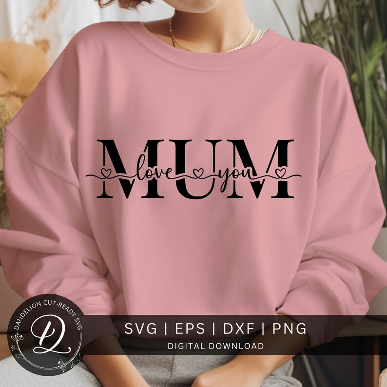 May include: A pink sweatshirt with a black graphic that says "MUM love you" with hearts on either side of the word "love".
