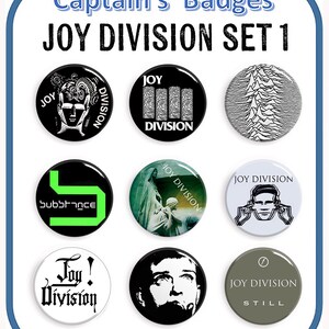 May include: A collection of nine 25mm D-Pin badges with Joy Division designs. The badges feature band logos, graphics, and the text "JOY DIVISION SET 1". The badges are circular and have a shiny finish.