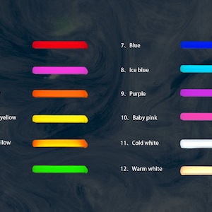 K&ouml;nnte beinhalten: Eine Tabelle mit 12 Farbmustern, die jeweils mit einer Nummer und einem Farbnamen beschriftet sind. Die Farben sind Rot, Rosa, Orange, Zitronengelb, Goldgelb, Gr&uuml;n, Blau, Eisblau, Lila, Babyrosa, Kaltwei&szlig; und Warmwei&szlig;.