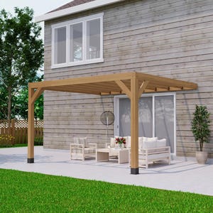 May include: A light brown wooden pergola structure installed over a patio area. The pergola features four vertical support posts with black base anchors and a slatted roof design, positioned against the exterior wall of a residential house.