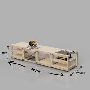 May include: A wooden workbench with two saw stations, one for a miter saw and one for a table saw. The workbench is 406 cm long, 101.5 cm wide, and 85 cm tall.