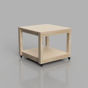 May include: A wooden table with a shelf and wheels. The table is made of light wood and has a natural finish. The table is on a gray background.
