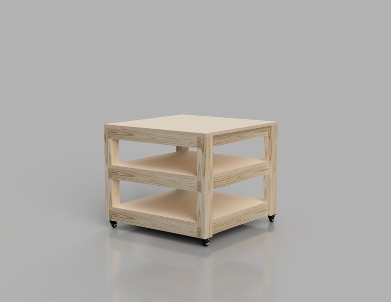 May include: A wooden shelf unit with three shelves and wheels. The shelf unit is made of light wood and has a natural finish.