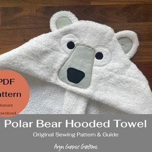 May include: A white hooded towel with a polar bear face on the hood. The towel is made of soft, absorbent material and is perfect for keeping little ones warm and dry after bath time. The PDF pattern is for an instant download.