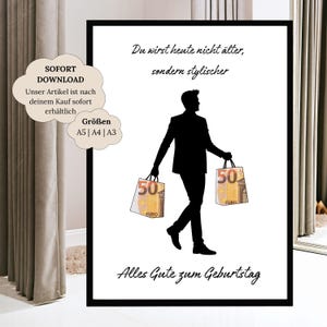 Pode incluir: Impressão emoldurada em preto com a silhueta de uma pessoa carregando sacolas de compras com "50 EURO" impresso. O texto em alemão é: "Du wirst heute nicht älter, sondern stylischer" e "Alles Gute zum Geburtstag."