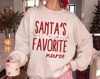 Sudadera navideña de la enfermera favorita de Santa, linda sudadera navideña de enfermera titulada