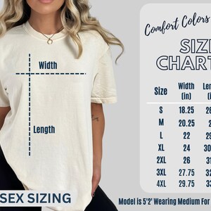 May include: Unisex sizing chart for a t-shirt in sizes S through 4XL. The chart shows the width and length of the shirt in inches. The model is wearing a size Medium.