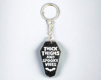 Thick thighs & spooky vibes keyring