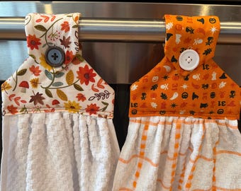 Hanging buttoned kitchen towel