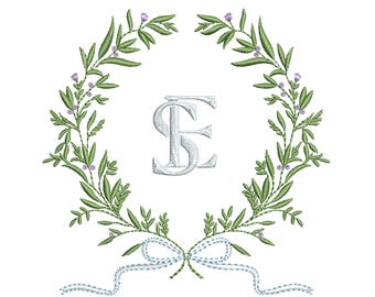 May include: A white monogram with the letters "S" and "E" intertwined, surrounded by a wreath of green leaves and purple flowers. A blue ribbon with a bow is tied at the bottom of the wreath.