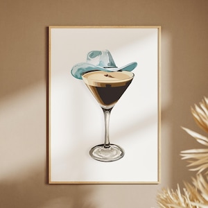 May include: A digital illustration of a martini glass with a blue cowboy hat on top. The drink is a layered coffee drink with a brown bottom and a light brown top.