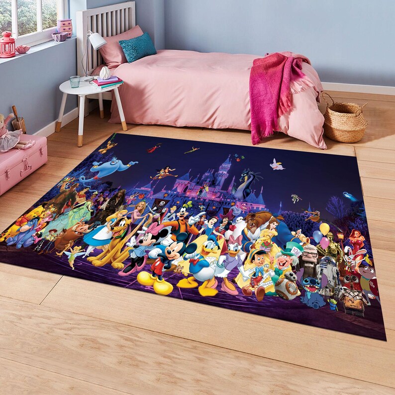 May include: A rectangular rug with a colourful Disney character design, including Mickey Mouse, Donald Duck, and princesses, set against a dark blue background with a castle. The rug is placed on a wooden floor in a bedroom setting.