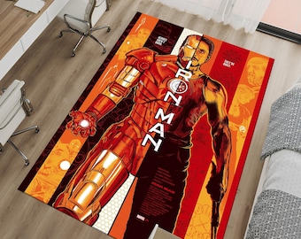 May include: A rectangular area rug featuring a vibrant illustration of Iron Man. The design showcases the character in his iconic red and gold armor, with the text "IRON MAN" prominently displayed. The rug has a Marvel logo.