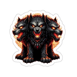 Puede incluir: Una pegatina con un lobo negro de tres cabezas con ojos rojos brillantes y detalles en naranja fuego. El lobo muestra los dientes y lleva un collar. La pegatina tiene un borde blanco.