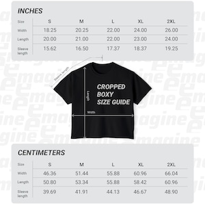 May include: A black cropped boxy t-shirt displayed with a size guide chart. The chart provides width, length, and sleeve length measurements in inches for sizes S, M, L, XL, and 2XL, and in centimeters for the same sizes, with labels on the shirt.