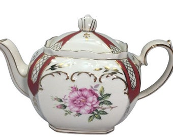 Rare théière vintage Sadler en porcelaine de Chine fabriquée en Angleterre Belle bordure en or rose sur les bords