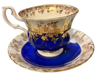 Belle tasse à thé et soucoupe Royal Albert en porcelaine de Chine fabriquée en Angleterre série Regal vintage bleu royal et or de collection et antique