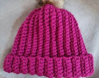 Beautiful crocheted winter hat with bobble