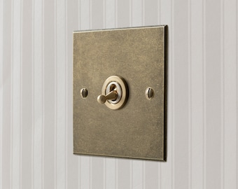 Dolly Light Switch, Antiqued Brass, Jim Lawrence 1 Gang Toggle