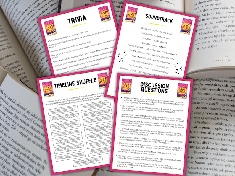 May include: Four pink cards with text and a book cover image are displayed on a table with open books. The cards include trivia, soundtrack, timeline shuffle, and discussion questions, all related to a book.