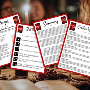 May include: Four white cards with red borders are displayed on a table. The cards have text and graphics, including recipes, a summary, creative writing prompts, and a dice game. A lit candle and wine glasses are in the background.