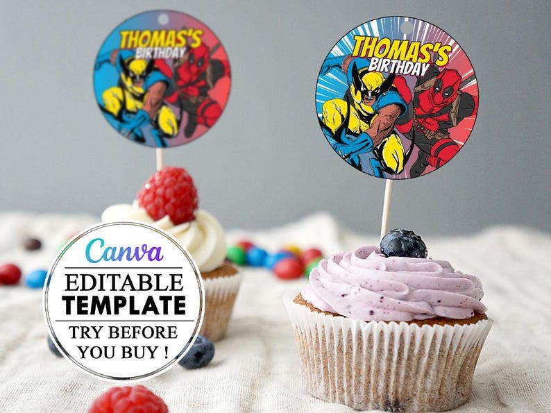 May include: Two round cupcake toppers featuring a comic book style illustration of Wolverine and Deadpool. The toppers are printed on white cardstock with a blue and red color scheme. The text on the toppers reads "Thomas's Birthday".