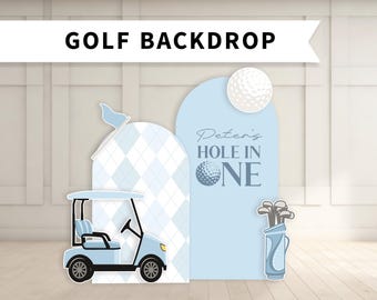 May include: A blue and white golf-themed backdrop with a golf cart, golf clubs, and a golf ball. The backdrop says "Peter's Hole in One".