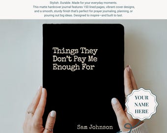 May include: A black hardcover journal with the text "Things They Don't Pay Me Enough For" in white. The journal is held open by two hands. The name "Sam Johnson" is printed at the bottom.