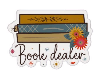 May include: A sticker featuring a stack of books with the words "Book dealer" in a whimsical font. The books are in shades of brown and blue, with floral accents and a decorative border.