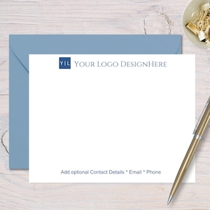 May include: A white stationery card with a blue square logo that says "YIL" and the text "YOUR LOGO DESIGNHERE" in blue. The card has the text "Add optional Contact Details * Email * Phone" at the bottom.
