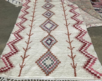 Moroccan Boucherouite rug with traditional and unique Berber design handmade with recyclable fabric