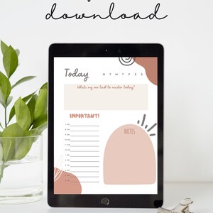 May include: A digital printable daily planner with a pink and brown color scheme. The planner includes a section for "Today", "Important!" and "Notes". The text "What's my one task to master today?" is at the top of the planner.