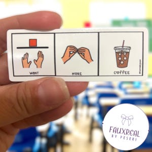 May include: A white sticker with three panels. The first panel shows hands reaching for a red square with the word "WANT". The second panel shows hands forming a shape with the word "MORE". The third panel shows an iced coffee with the word "COFFEE".
