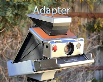Adaptador de trípode Deluxe SX-70 (ángulo integrado y agarre fuerte)