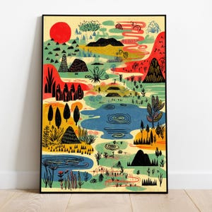 May include: A framed landscape art print with a vibrant, colorful design. The artwork features a red sun, blue lake, and various stylized trees and mountains in shades of green, yellow, and red. The print is in a black frame.
