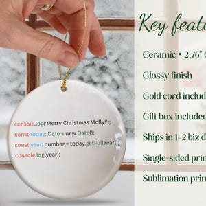 May include: A white ceramic Christmas ornament with a glossy finish, 2.76 inches (70 mm) in diameter, featuring a gold cord. The ornament has text in a programming language. Includes a gift box.