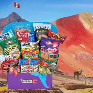 May include: A purple Pachanga Box overflowing with various snacks and treats, including chips, cookies, and candies. The box is set against a backdrop of a mountain landscape with a Peruvian flag waving in the sky. Two llamas are in the background.