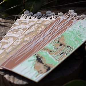 Each bookmark showcases a unique two sided design.