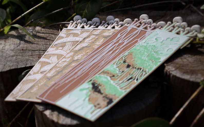 Each bookmark showcases a unique two sided design.