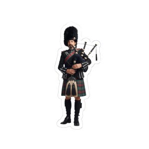 May include: A sticker featuring a Scottish bagpiper in traditional attire. The bagpiper wears a black jacket with white stripes, a red and green tartan kilt, and a tall black hat. The bagpipes are black and silver.