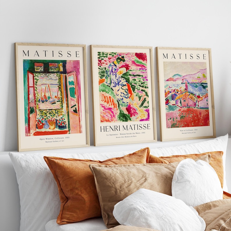 May include: Three framed art prints featuring colorful abstract paintings by Henri Matisse. The prints are titled "Open Window, Collioure 1905", "La Japonaise - Woman beside the Waist, 1905", and "View of Collioure, 1905".